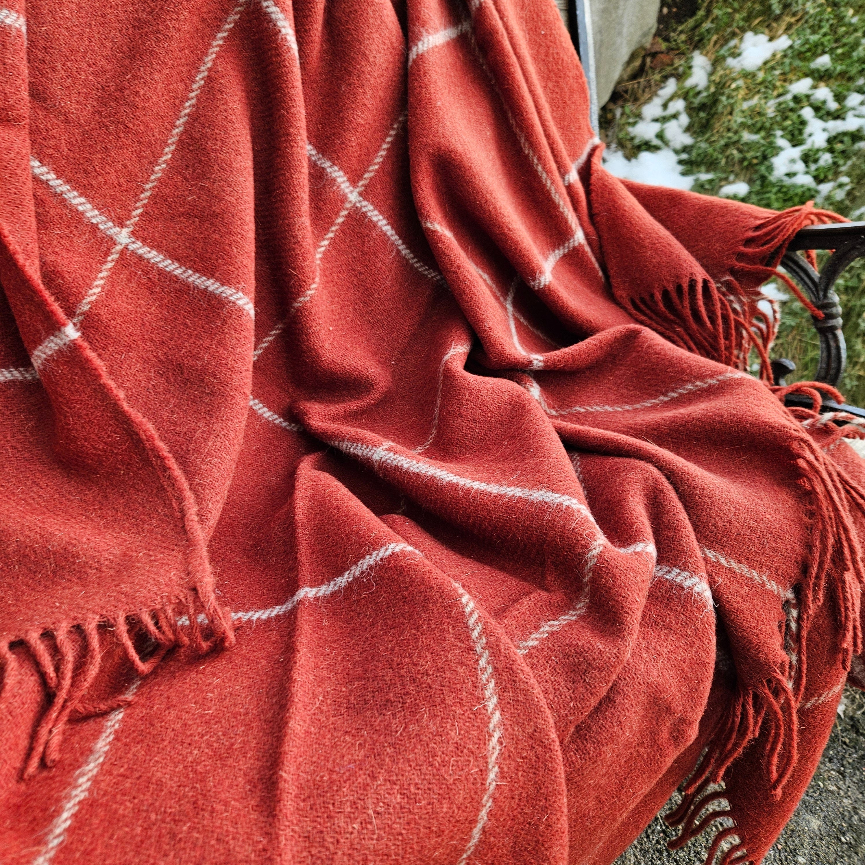 Brick red wool blanket for cozy hygge home