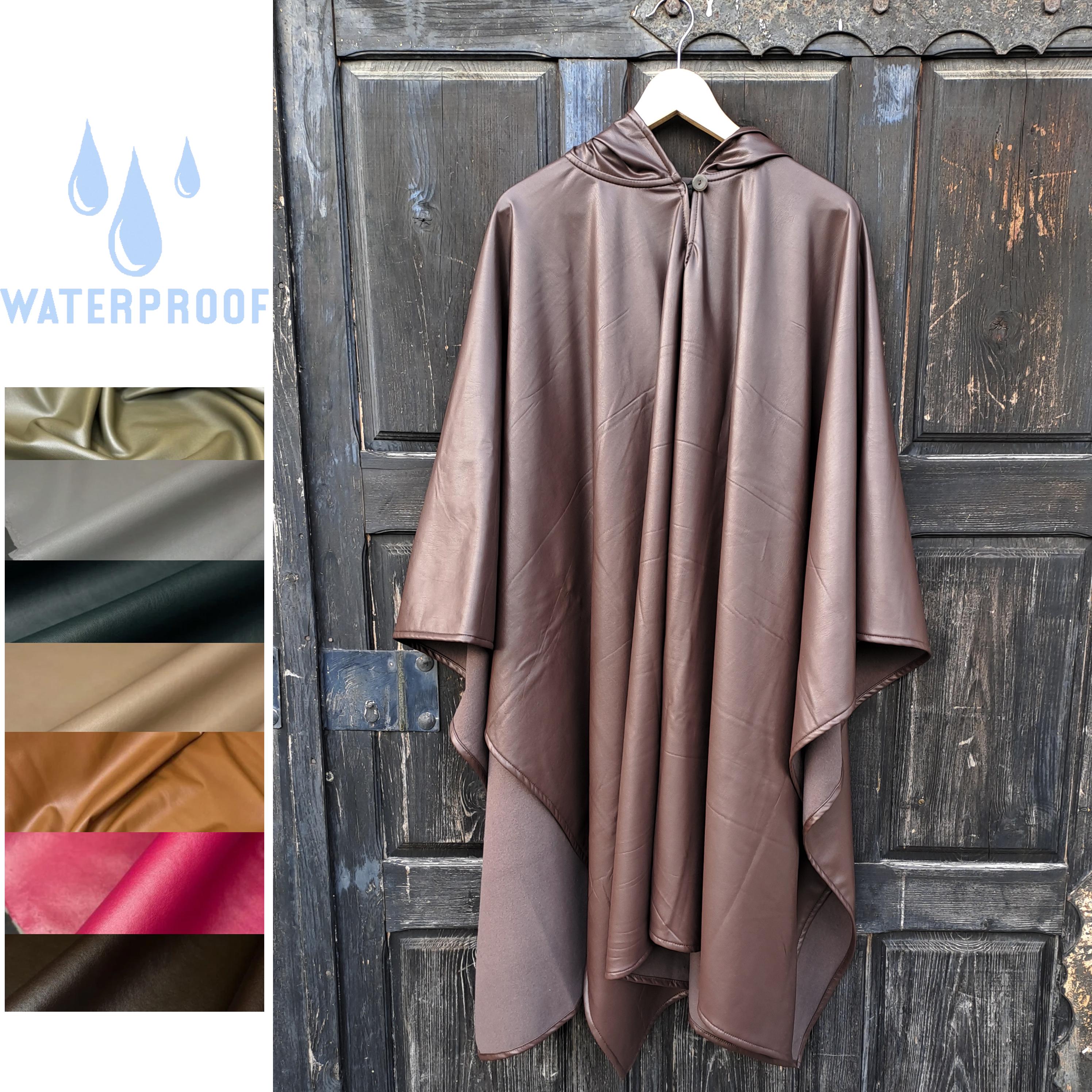 Rain poncho OLAND Unisex ruana cape waterproof - black rain jacket poncho with hood Comfortable cloak windproof waterproof In2Nord