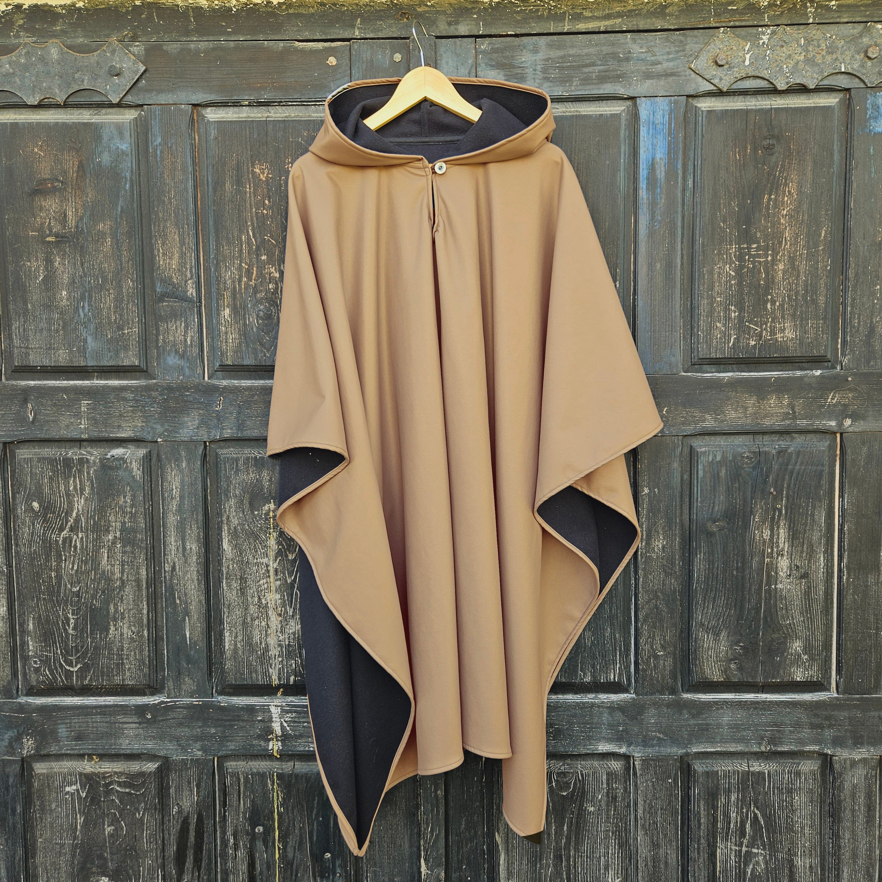 rain poncho in beige for women or menfor hiking or autumn rainy weather