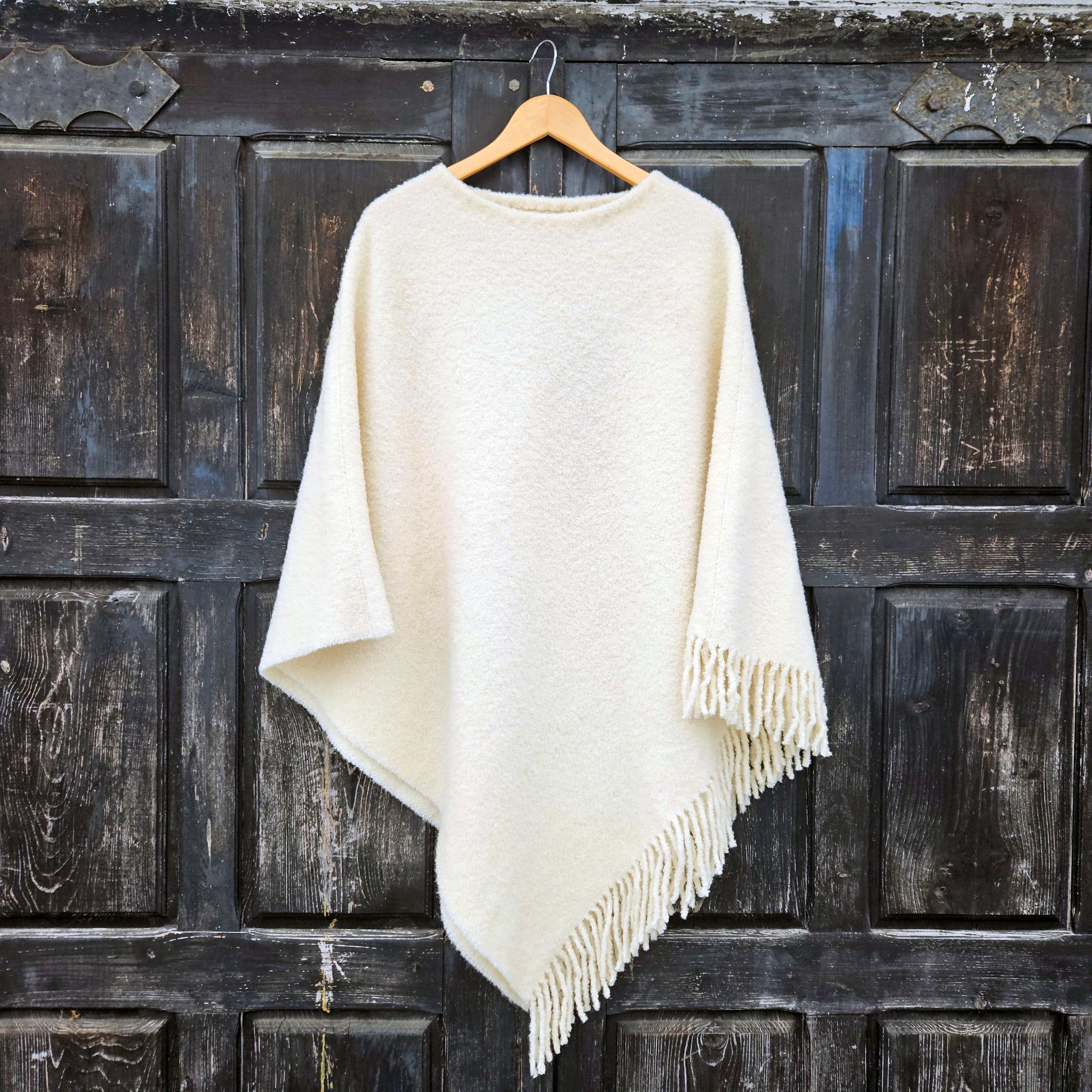 Wool Blanket Poncho Kiruna - Black Hooded Wool Cape With Fringes | Comfortable Unisex Cloak