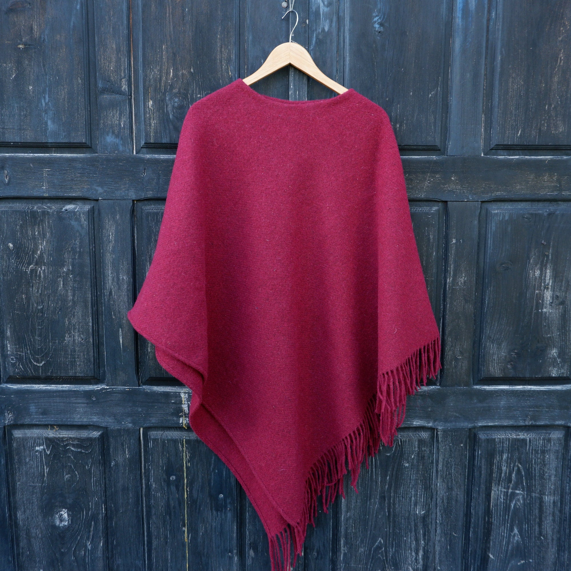 red wool blanket poncho with hood - Kiruna - hooded cape ruana with fringes -  Comfortable wool cape for outdoor - In2Nord